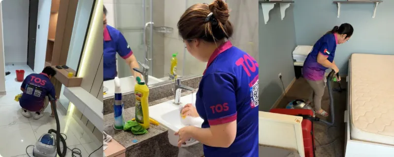 TopOne cleaner cleaning a bathroom sink in a Dubai apartment